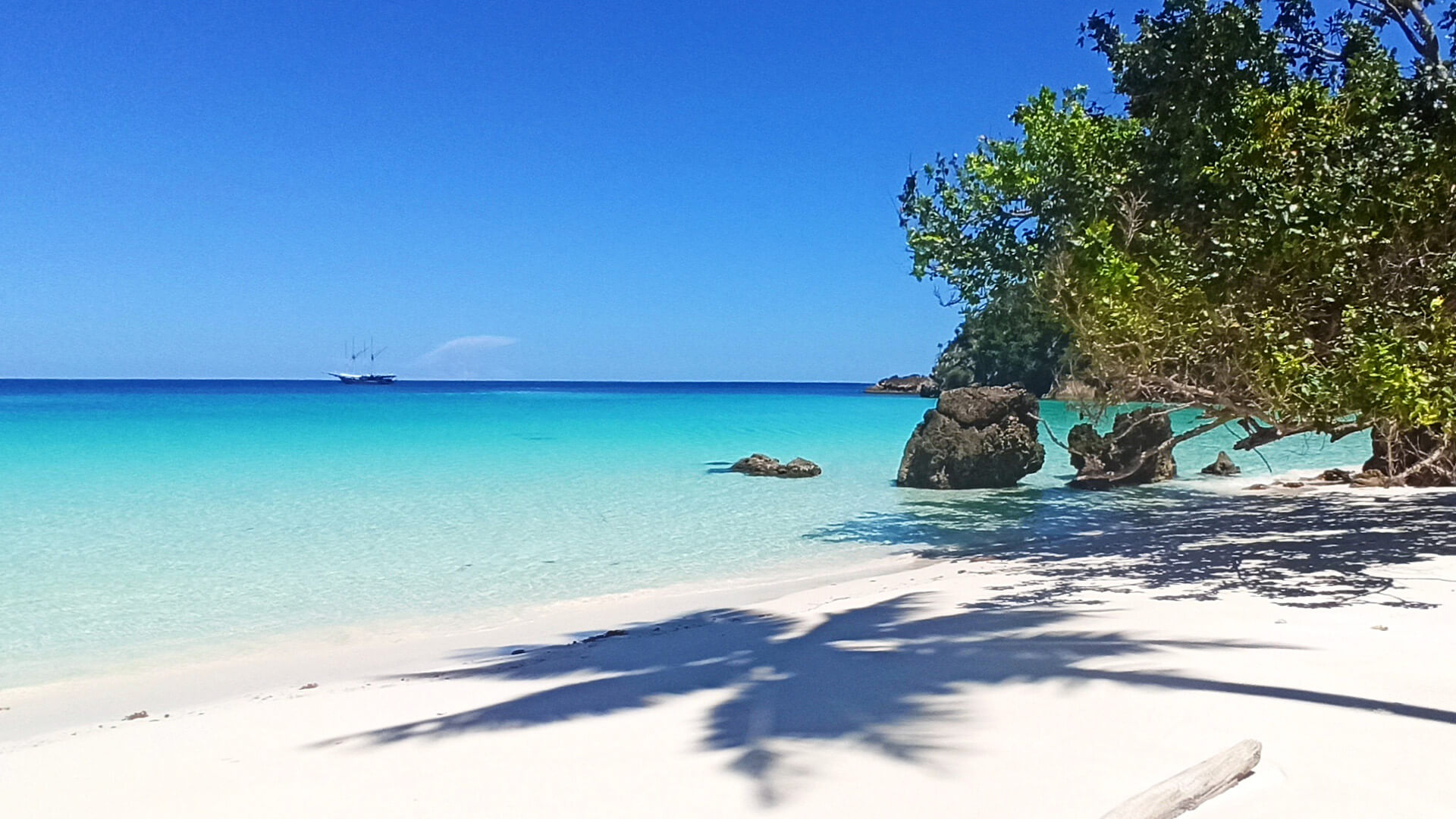 White sand secluded beach in Halmahera in Indonesia